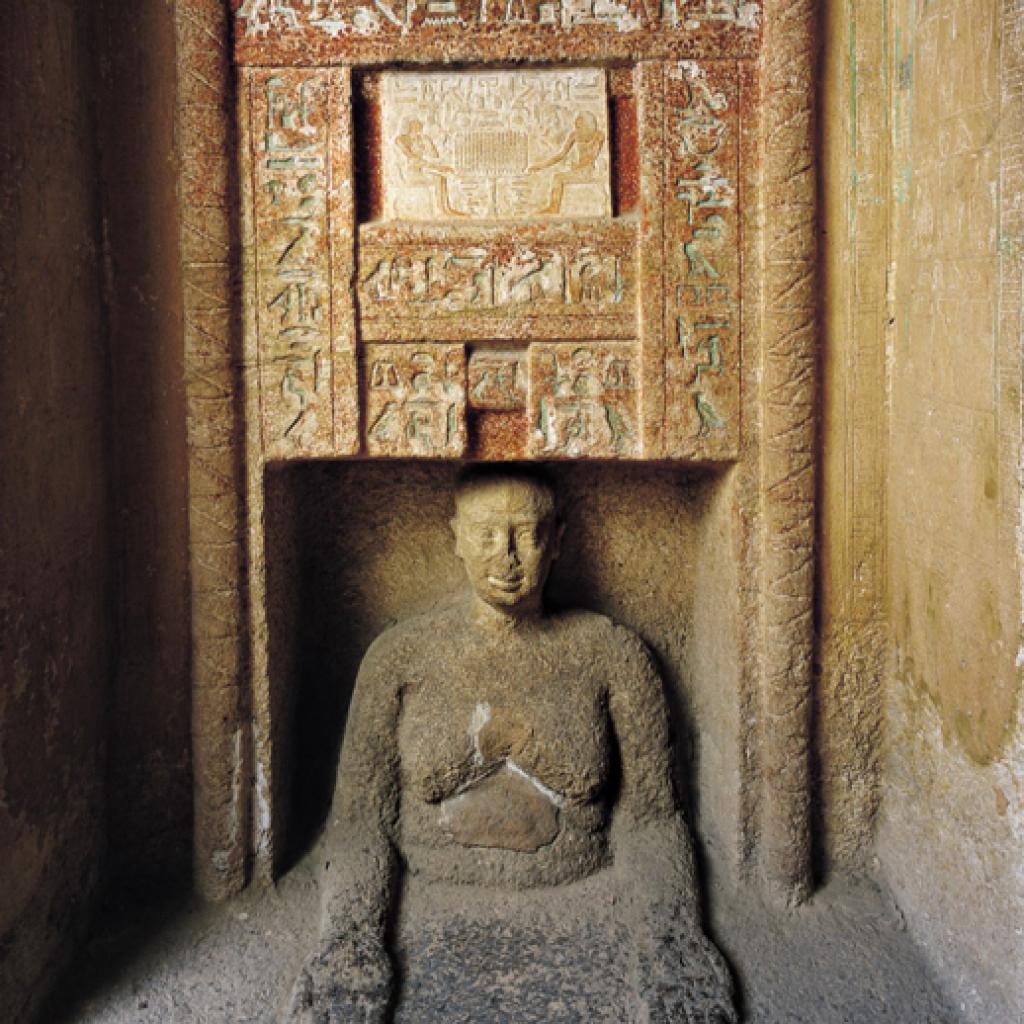 Plate XXIX. a. Idu, west wall, niche with statue
