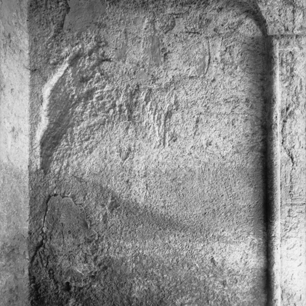Plate XIV. b. Qar, Room E, west wall, left of stela
